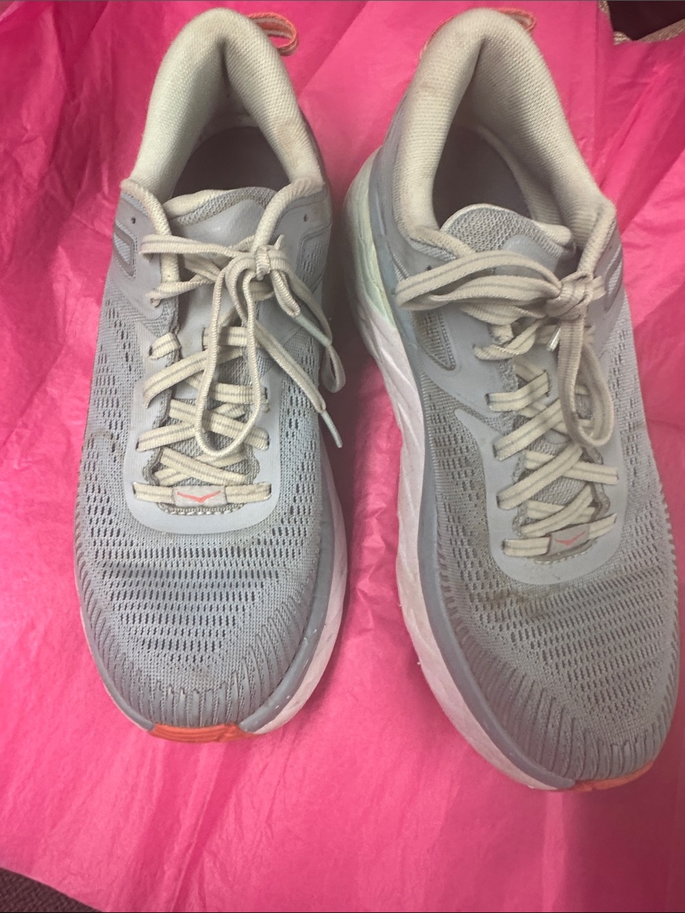 Hoka Women's Light Gray Athletic Hoka Running Shoes with Subtle Orange Accents